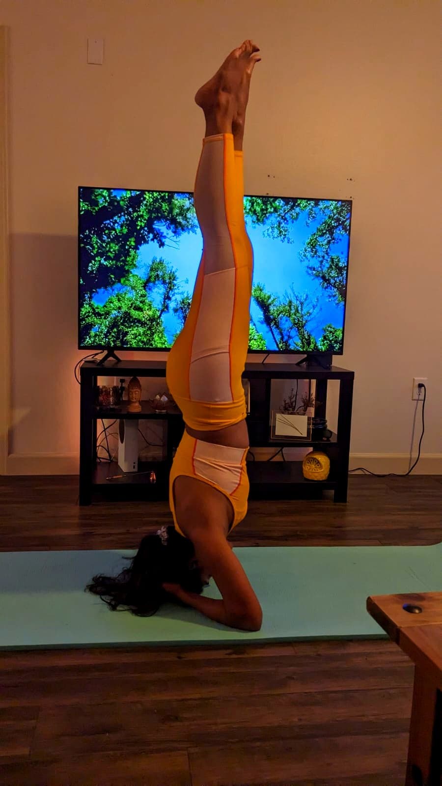 Supported headstand during home practice.